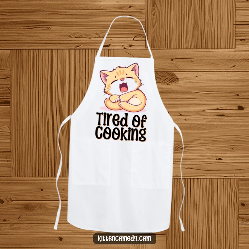 Funny Kitten Sunbeam Apron: A tired kitten yawning widely in a sunbeam, a humorous kitchen accessory.