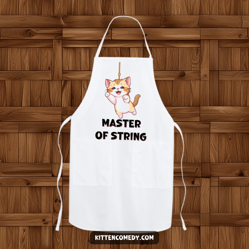 Funny kitten apron depicting a playful kitten ready to pounce on a dangling string, perfect for adding humor to kitchen activities.