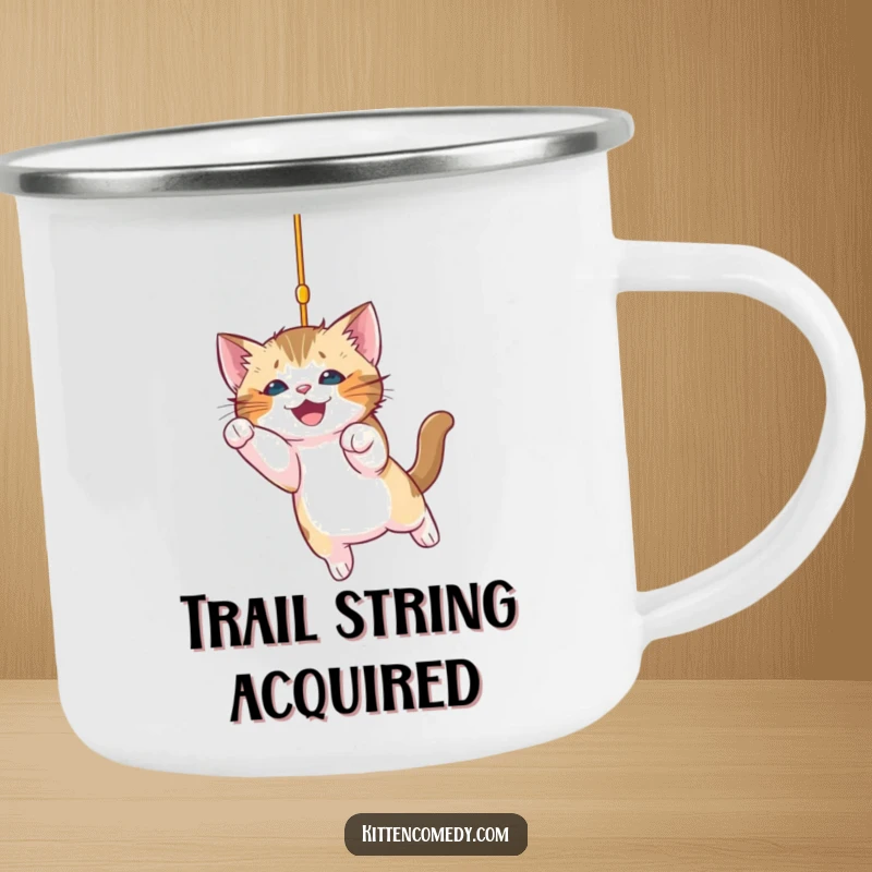 Funny kitten camping mug featuring a playful kitten pouncing on a string, ideal for outdoor adventures and adding humor to drinks.
