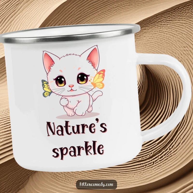 Funny kawaii kitten enamel camping mug showing a wide-eyed cat chasing a glowing butterfly.
