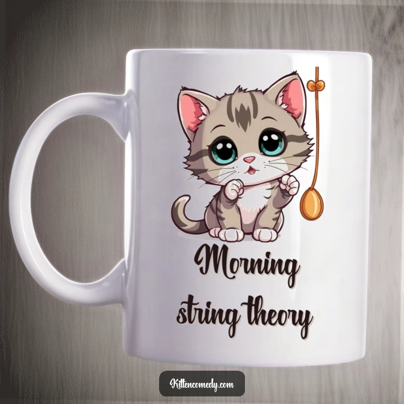 Funny curious kitten batting at a dangling string with wide eyes, a captivating mug.