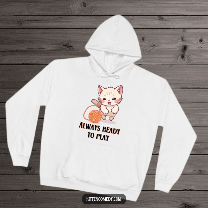 Funny Kawaii Kitten Hoodie: A cozy hoodie featuring a kitten joyfully chasing a yarn ball, a playful and humorous present.