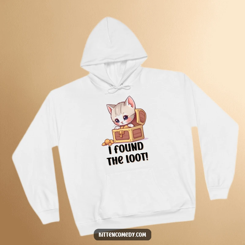 Funny curious kitten hoodie, peering into a tiny treasure chest, radiating a sense of wonder and playful exploration.