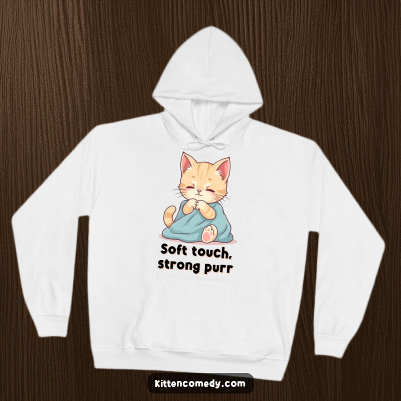Funny hoodie showcasing a kitten contentedly kneading fabric. Soft, warm, and irresistibly cute.