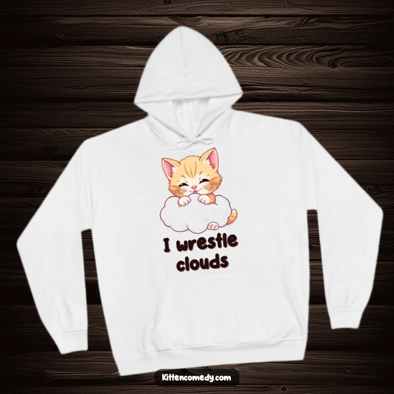 Funny cheerful kitten hoodie, playfully tussling with a fluffy cloud, depicting sweet dreams and cozy adventures.