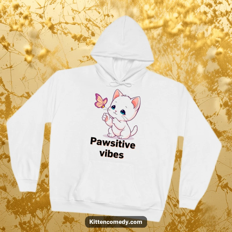 Funny Kawaii Kitten Hoodie: A tender kitten delicately swipes its paw at a gracefully floating butterfly, radiating calm.