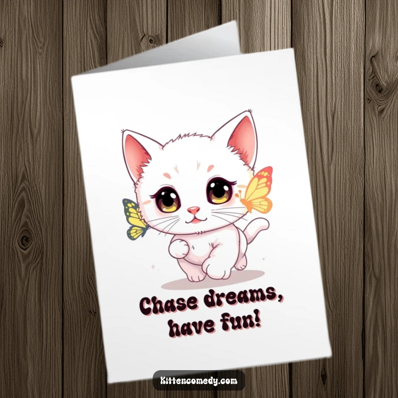 Funny Free Printable Birthday Card: Kawaii kitten with wide eyes excitedly chases a glowing butterfly, celebrating joyfully.