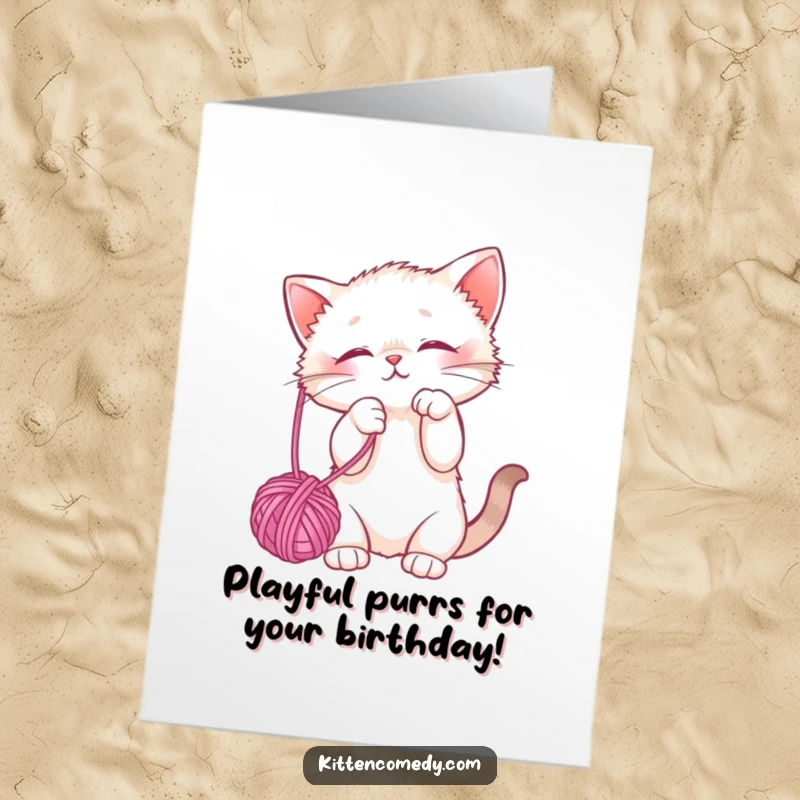 Funny Free Printable Birthday Card with a cute kitten playfully batting at a dangling yarn ball, perfect for a DIY celebration.