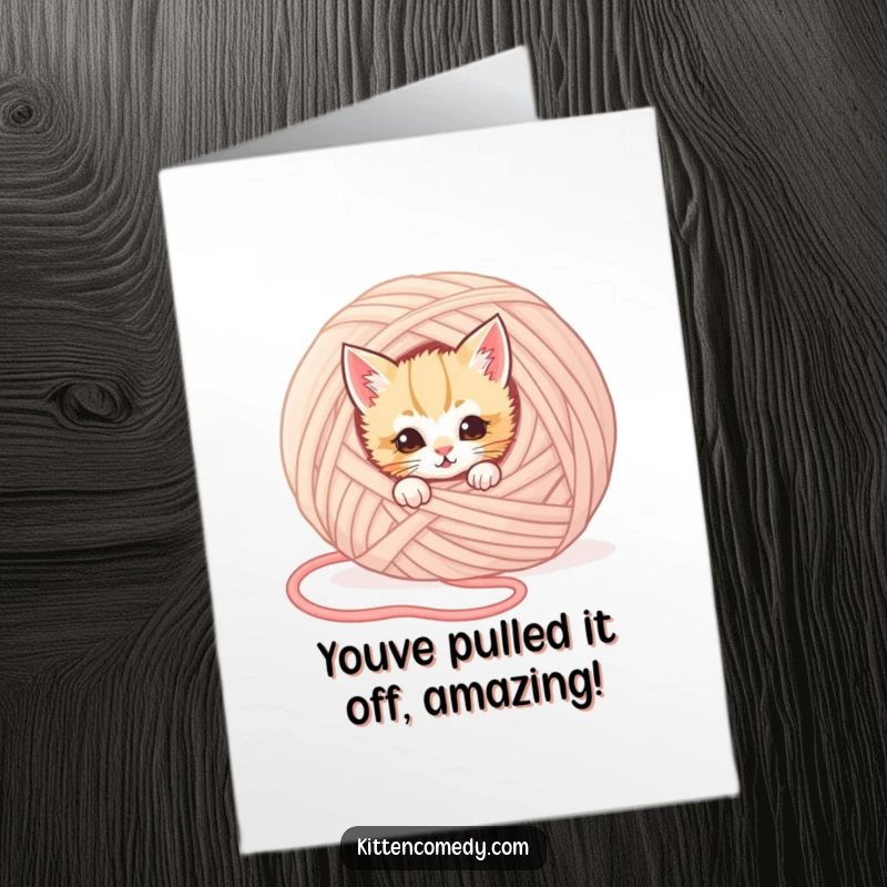 Funny Free Printable Congratulations Card: A playful kitten hides behind yarn, peeking out mischievously.
