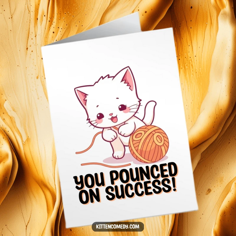 Funny Free Printable Congratulations Card: Kawaii kitten character playfully chasing a ball of yarn, celebrating success with energetic feline antics.