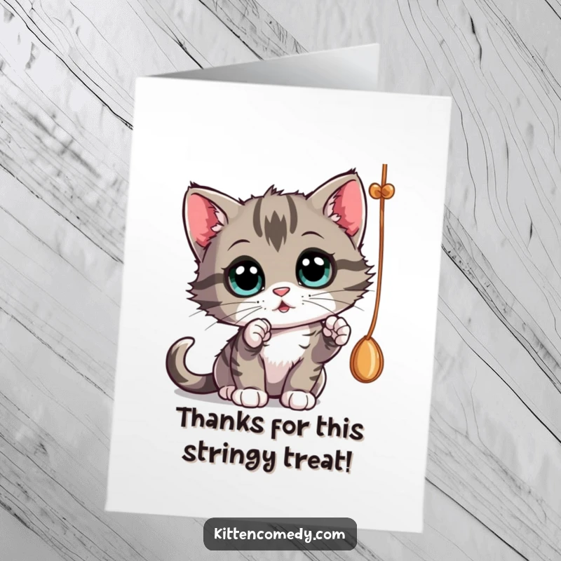 Funny Free Printable Thank You Card: A curious kitten bats at a dangling string with wide eyes, offering a playful thank you.