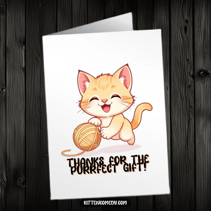 Funny Free Printable Thank You Card: A happy kitten joyfully chases a bouncing yarn ball, conveying playful gratitude.