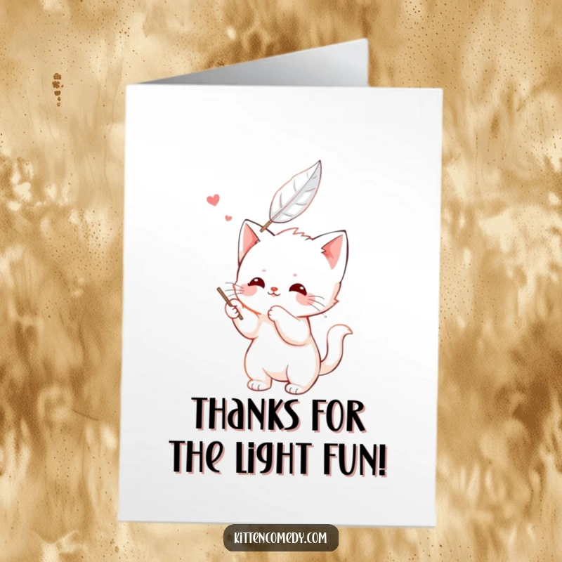 Funny Free Printable Thank You Card: Kawaii kitten character happily batting at a floating feather, conveying thanks with lighthearted feline grace.