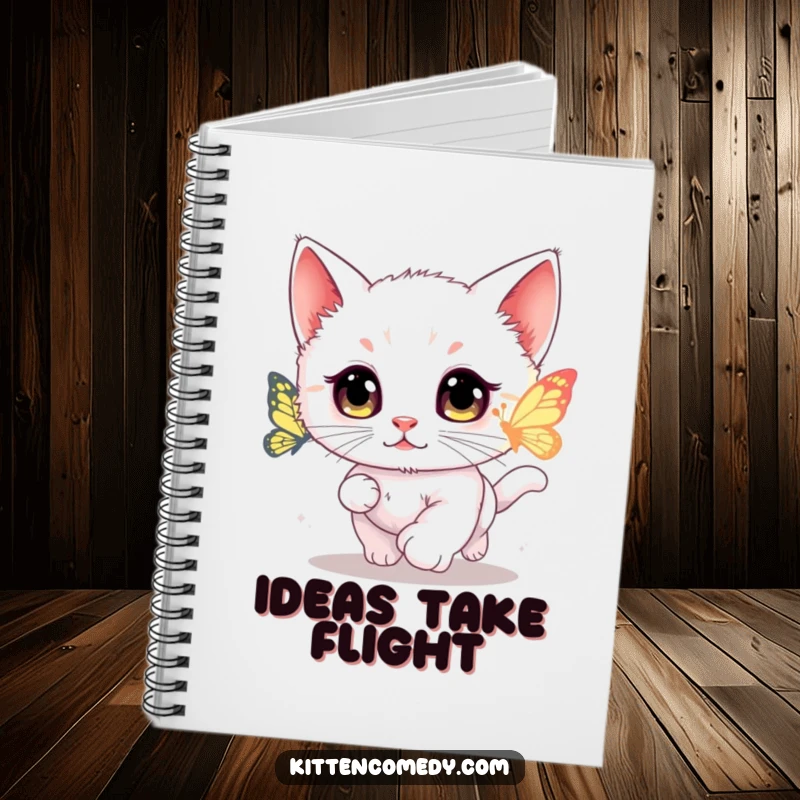 Funny kawaii kitten notebook cover featuring a wide-eyed cat chasing a glowing butterfly.
