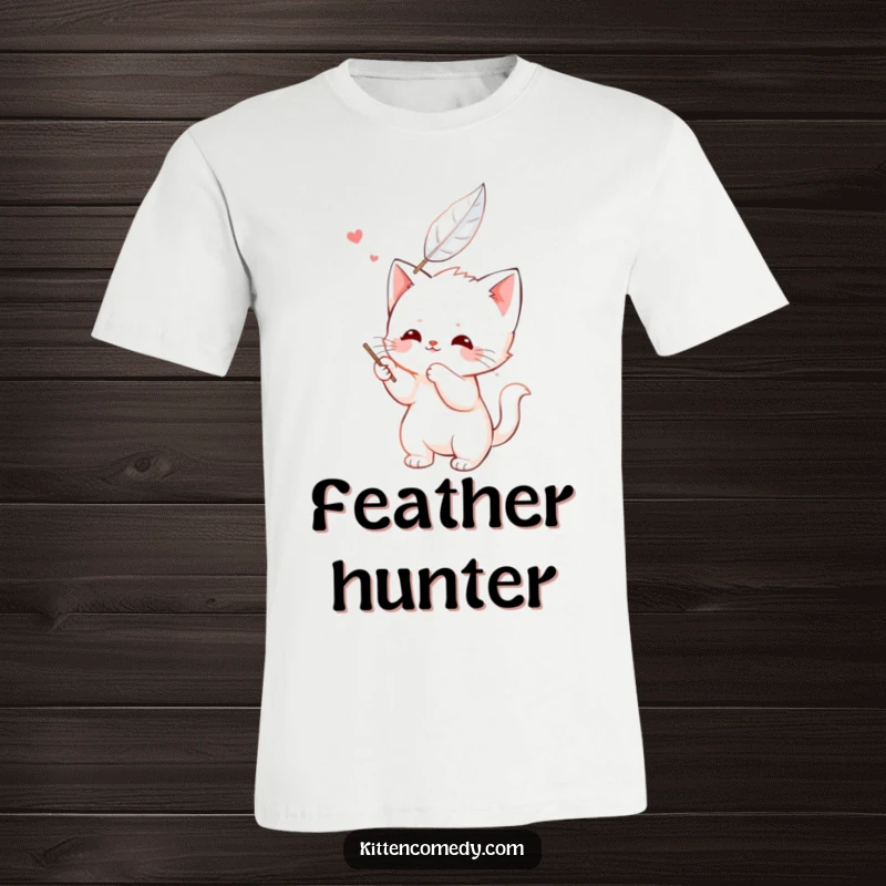 Funny kawaii kitten t-shirt, happily batting at a floating feather, a cute and energetic scene.
