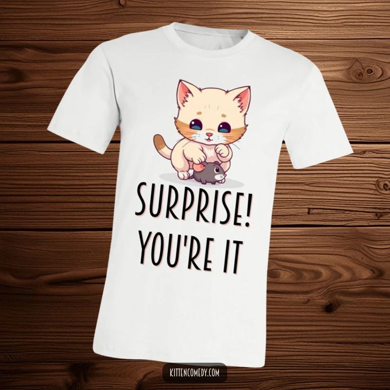 Funny kitten t-shirt showing a mischievous cat mid-pounce on a toy mouse, embodying surprise and playful energy for ultimate humor.