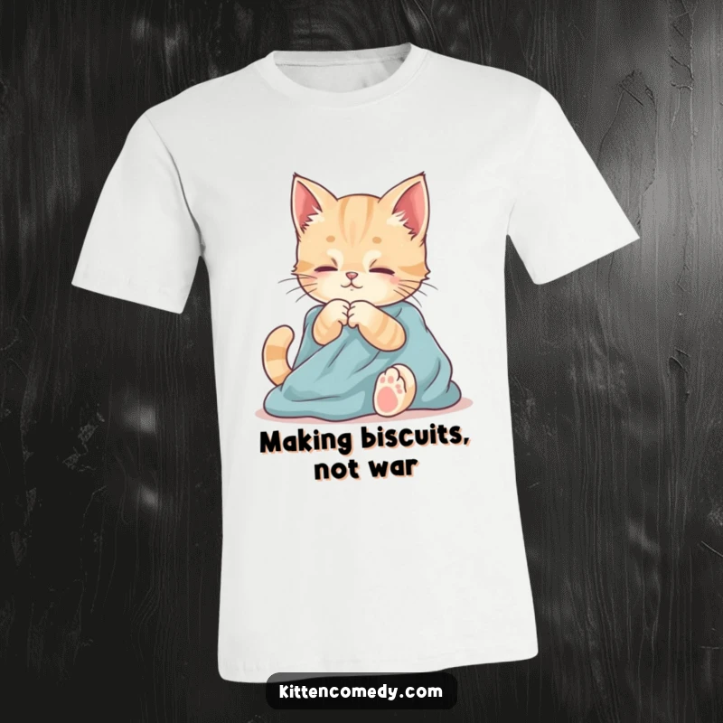 Funny t-shirt featuring a kitten playfully kneading soft fabric. Captures the gentle, comforting nature of cats.