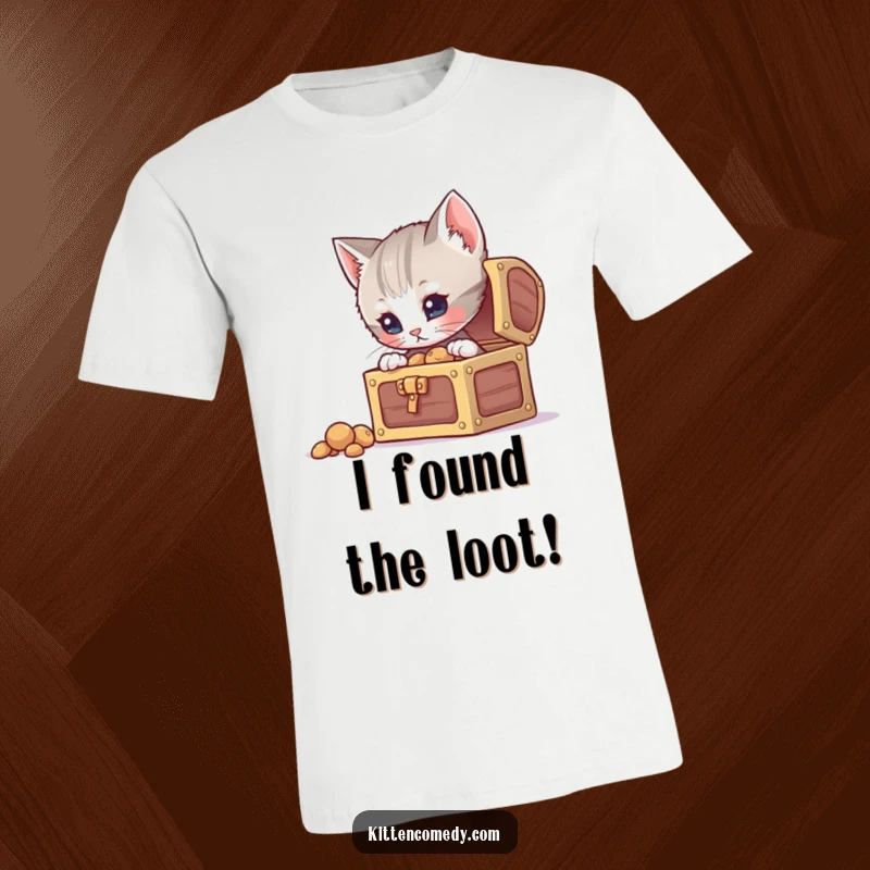 Funny curious kitten t-shirt, peeking into an open treasure chest, embodying a spirit of adventure and wonder.