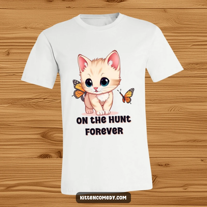 Funny t-shirt featuring a kitten with wide, curious eyes chasing a butterfly, perfect for those who love playful cats.