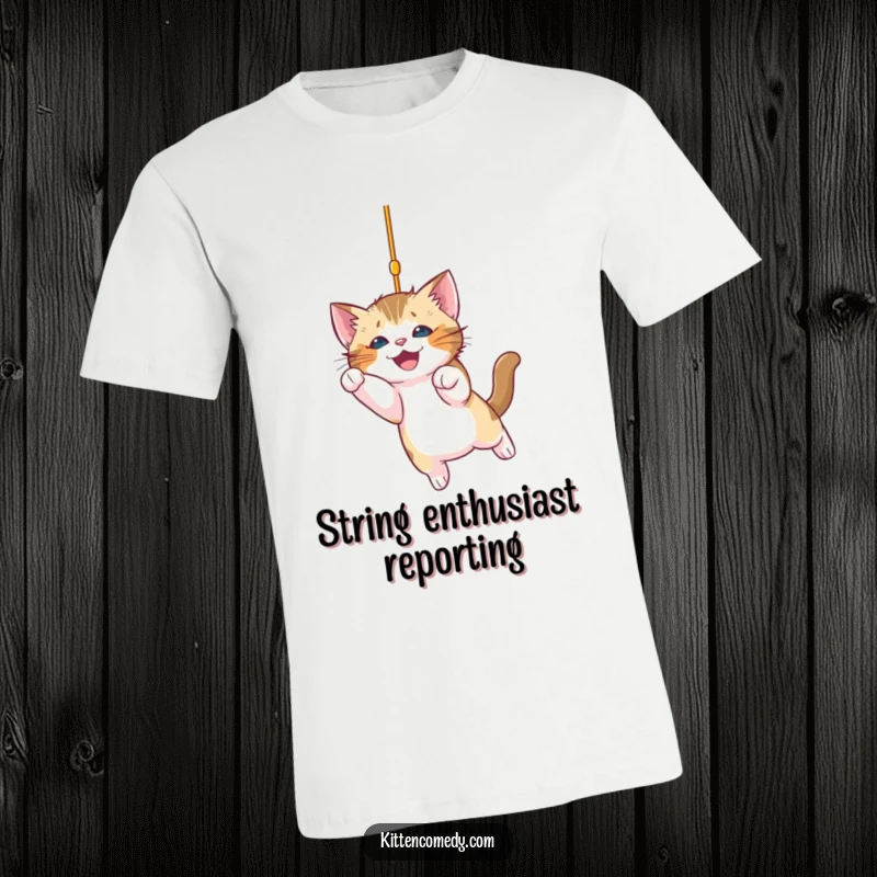 Funny kitten t-shirt featuring a playful kitten mid-pounce on a sparkly string, capturing pure feline excitement and a humorous pose.