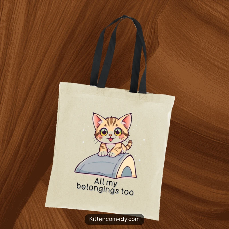 Funny sliding kitten tote bag, featuring a wide-eyed kitten sliding down a ramp, perfect for carrying items with a sense of hilarious adventure.
