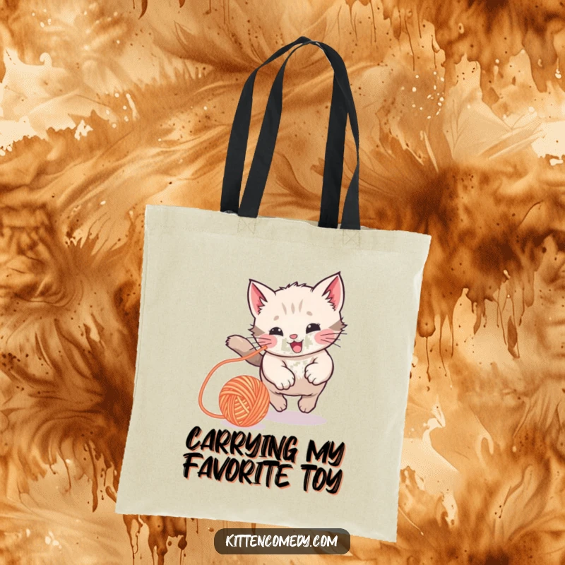 Funny Kawaii Kitten Tote Bag: A tote bag featuring a kitten chasing a yarn ball, perfect for carrying essentials with humor.
