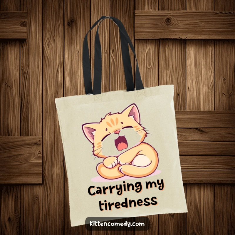 Funny Kitten Sunbeam Tote Bag: A tired kitten yawning while curled in a sunbeam, a humorous and practical bag.