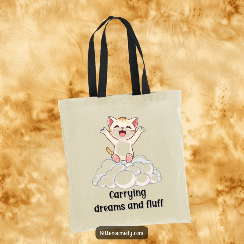 Funny tote bag depicting an excited kitten character taking a delightful leap into a heavenly pile of soft, fluffy clouds.