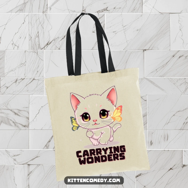 Funny kawaii kitten tote bag showing a wide-eyed cat intensely chasing a glowing butterfly.